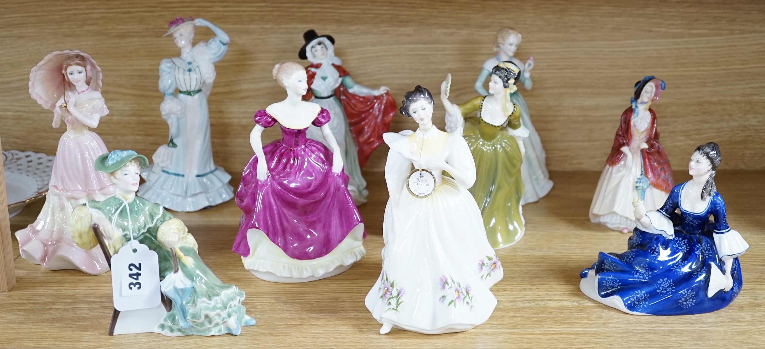 Seven Royal Doulton figurines and three Coalport figurines